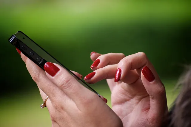 hand, phone, red, phone, phone, phone, phone, phone. Finance influencers: what to send an approver before filming