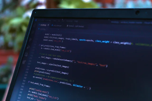 Close-up view of a computer screen displaying code in a software development environment. Finance creators AI applications: what reviewers check