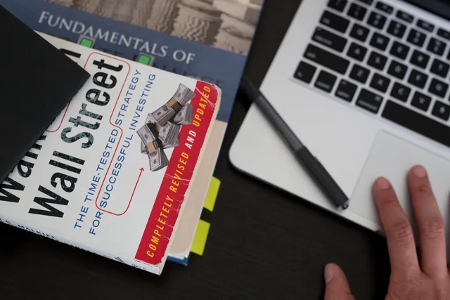 macbook, laptop, computer, office, desk, business, working, hands, pen, wall street, books, finance, technology, gray business, gray computer, gray office, gray book, gray technology, gray laptop, gray books, gray work, gray wall, gray finance, gray street, gray desk, gray company. Ethical investing content for Bristol finance influencers